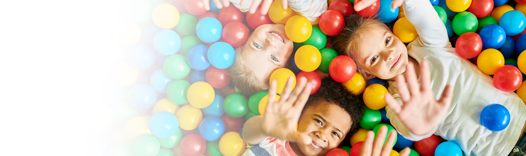 Children playing in a ball pit