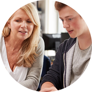 Mother and son reviewing scholarships