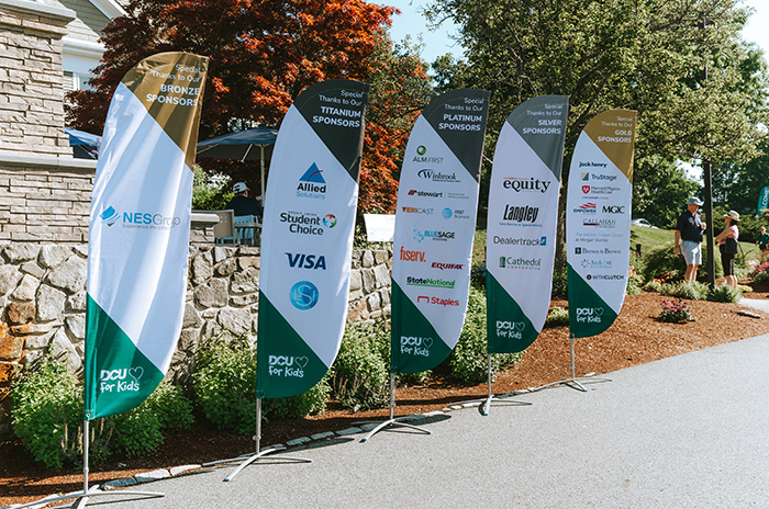 flags from DCU For Kids sponsors lined up