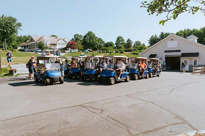 people in golf carts